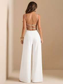 SHEIN BAE Bộ jumpsuit đen hở lưng, jumpsuit ống rộng hai dây gợi cảm dành cho nữ, trang phục thanh lịch để đi chơi hàng ngày, hẹn hò, dự tiệc. - trắng - Xem 1