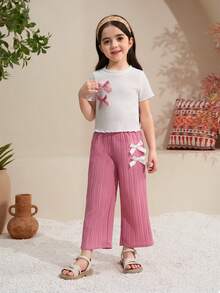 Elladie kids 两件套，包括带有3D蝴蝶结装饰的纹理面料T恤和休闲裤，非常适合居家或户外休闲穿着。女童裤装套装，年轻女孩服装套装，短袖套装，喇叭裤套装，可爱套装，年轻女孩休闲夏季两件套，两件套，年轻女孩可爱复古风格两件套，年轻女孩百褶裤套装，两件套，百褶裙套装。 - 粉色 - 查看 7