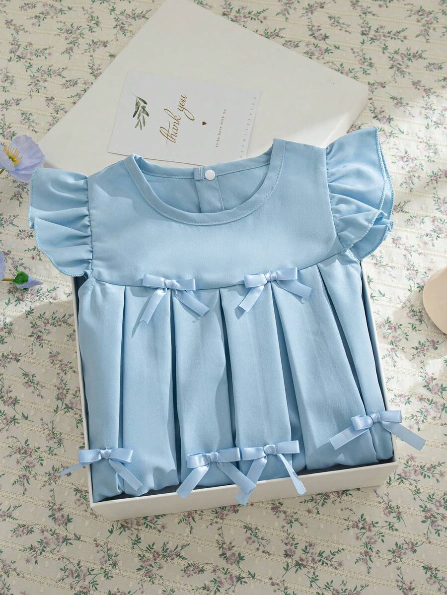 Souflis Souflis Vestito casual da tutti i giorni per bambine in stile vintage francese, con fiocco azzurro chiaro e dettagli plissettati - celeste - Visualizzare 1