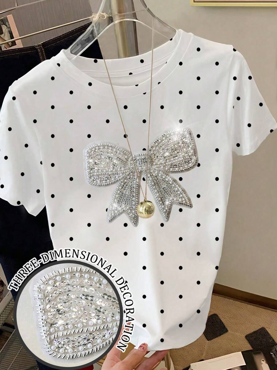 Resyla 甜美可爱的黑白波点印花女士修身T恤，饰有手工蝴蝶结串珠装饰。非常适合夏季穿着，时尚百搭，是送给兄弟姐妹、姐妹、妈妈、母亲节的理想礼物，休闲又不失优雅。 - 白色 - 查看 1