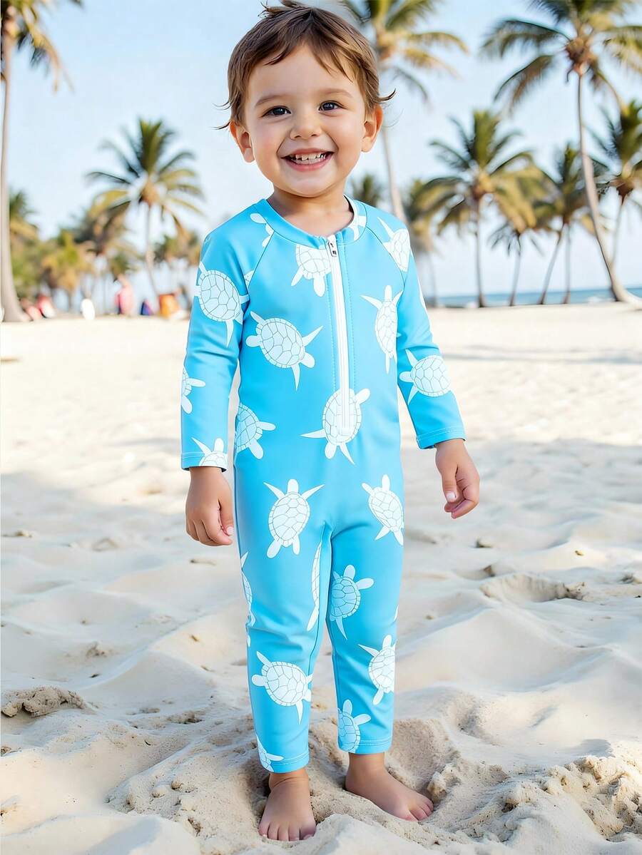 SHEIN Đồ bơi cho bé trai, áo tắm liền thân, tay dài và quần dài, có khóa kéo dễ mặc vào và cởi ra, vải dệt kim, họa tiết rùa dễ thương in kỹ thuật số, đồ bơi đi biển cho bé trai. - Màu xanh lam - Xem 1