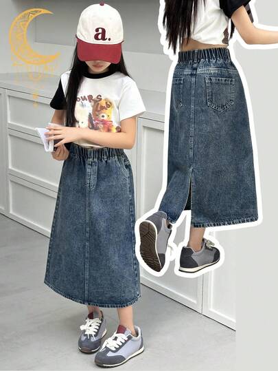 SHEIN Genkimix Kids 少女深色水洗牛仔A字裙，甜美休闲，夏日必备！采用柔软深蓝色水洗牛仔面料，搭配松紧腰带，方便穿着。喇叭形A字廓形和侧开衩设计，打造轻松休闲的造型。非常适合日常出游、学校、校园生活、返校季、度假等场合，打造轻松随意又不失时尚的风格！