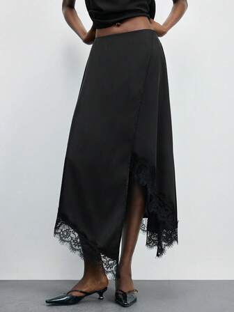Maija Falda elegante y de moda con bajo asimétrico y encaje en contraste negro para mujer