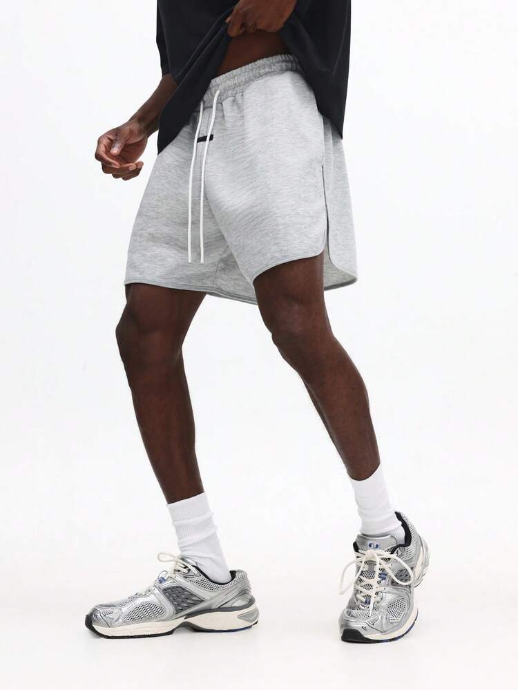 Jogging-Shorts mit abgerundetem Saum und Kordelzug