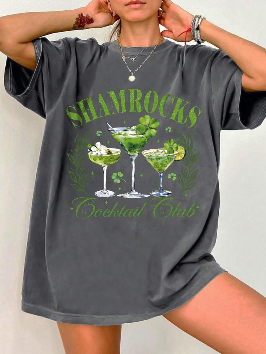 INAWLY Áo thun cổ tròn tay ngắn họa tiết cỏ ba lá dành cho nữ, thích hợp cho tiệc cocktail Ngày Thánh Patrick - Màu xám đen - Xem 1