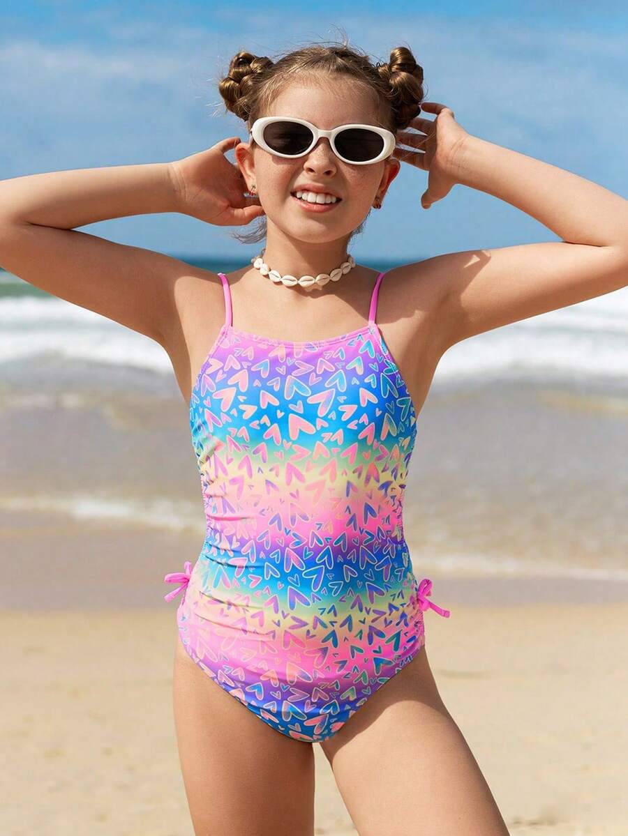 SHEIN 少女风吊带背心式泳衣，花卉印花，可调节肩带，蝴蝶结设计，甜美优雅，适合度假、海滩、泳池、冲浪等场合。