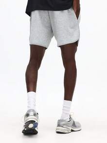 SUMWON Quần short jogger vải thun Pháp, gấu quần cong, eo có dây rút và túi bên hông, thích hợp mặc hàng ngày trong mùa hè. - Màu Xám nhạt - Xem 2