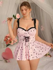 DelicateAllure Pink & Black Heart Print, Bow Strap, Tie Waist, Ruffle Hollow Back Sexy Romper Dress