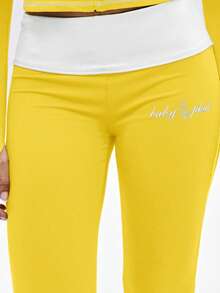 BABYPHAT Quần legging ống loe phối màu tương phản, cạp cao, viền ren, kiểu quần chuông. - Vàng nhạt - Xem 7