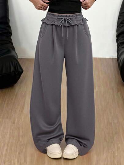 Sparklyn 一套女士及少女时尚宽松舒适灰色卫衣裤套装，采用毛边下摆设计，喇叭裤型，适合休闲、旅行、聚会、运动、上学、通勤等多种场合，春、秋、冬三季皆宜。