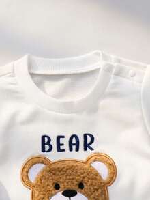 Cozy Pixies Conjunto de 2 piezas para bebé recién nacido niño/niña: Top de cuello redondo de manga corta con patrón de oso de punto suave y pantalones cortos de cintura elástica - Blanco - Ver 4