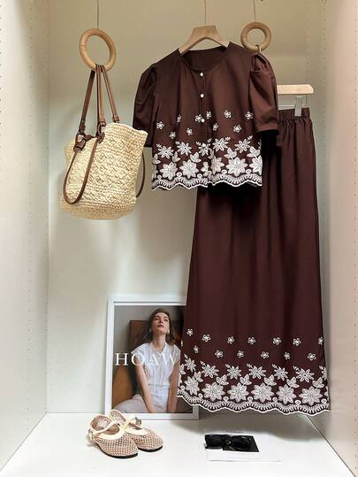 SHEIN Frenchy Women's Floral Embroidery Bubble Short Sleeve Shirt And Skirt 2 Pieces Set, Casual Vacation Style, Spring/Summer/Autumn,Contrasting Color Embroidery Design,French Retro Embroidered Lace Short-Sleeved Top + High-Waisted Skirt Two-Piece Set,Brown Suit,Slimming And Elegant Casual Suit,Beach Vacation Outfits For Women,Graduation,Summer Holiday Outfits Brown Set Women