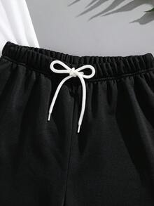 SHEIN 青少年男童休闲撞色印花短袖T恤和短裤两件套,舒适百搭,适合日常穿着、上学、郊游、户外活动、音乐节、假期、海滩度假、夏季、春夏穿着。 - 黑與白 - 查看 10