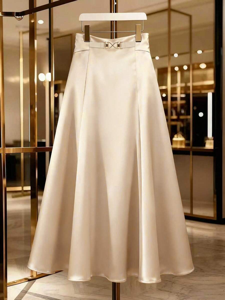 GlowEve 2026春夏新款高腰显瘦长裙，优雅休闲百搭A字裙，交叉绑带设计，蓬松伞裙造型，金属链条装饰，适合教师节和节日穿着。 - 杏色 - 查看 1