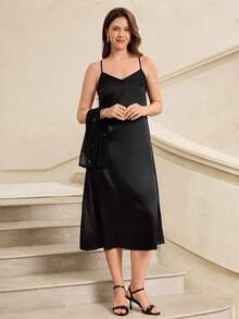 Miaspire This Elegant Women's Dress Features A Classic Pure Black Base. The Sheer Fabric Of The Bodice Is Adorned With Delicate Shimmering Silver Threads, Creating A Textured Contrast With The Matte Satin Skirt, Exuding A Subtly Luxurious Feel. The Floral Pattern Is A Minimalist Solid Color Design, Understated Yet Sophisticated. The Silhouette Consists Of A Sheer Long-Sleeved Top, A Belted Waist, And A Flowing Satin Skirt. The Lightweight Fabric Is Versatile Enough For Various Occasions, Showcasing Elegant Style. Perfect For Summer, It's Suitable For Evening Events, Casual Gatherings, Or Romantic Dates. The Pure Black Base Conveys A Sense Of Sophistication, While The Combination Of Sheer Fabric And Satin Showcases Fashionable Taste. It's A Versatile And Stylish Choice For Your Summer Wardrobe.,Summer Outfits - Black - View 6