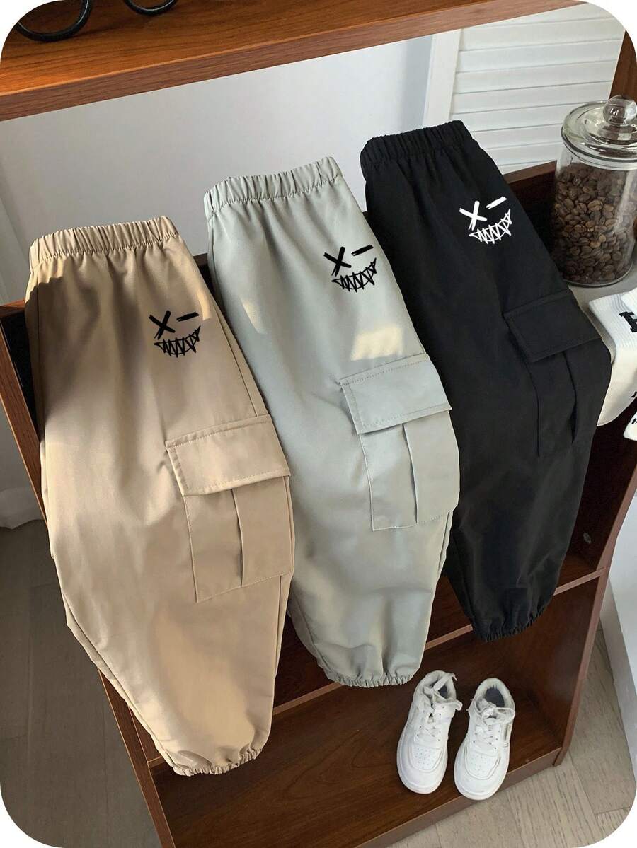 SHEIN 3件套男童休闲运动街头风可爱度假宽松抽绳裤,黑色装饰款,绿色抽绳裤,卡其色抽绳裤,适合日常穿着、上学、外出、运动,春夏秋冬皆宜。 - 彩色 - 查看 1
