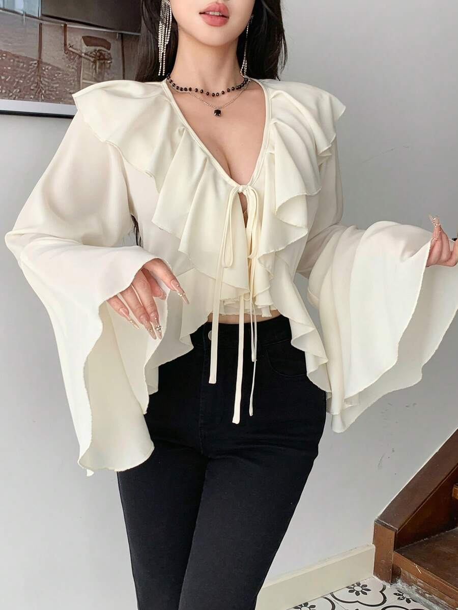 DAZY Elegancka bluzka damska w jednolitym kolorze z falbanką i mankietem, z bufiastymi rękawami, wiosna/lato - Beżowy - Zobacz 1