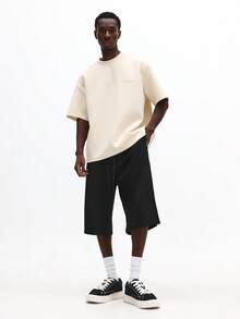 Quần short jogger SUMWON dáng suông, có dây rút và chi tiết sọc bên hông, thích hợp cho phong cách đường phố mùa hè. - màu đen - Xem 3