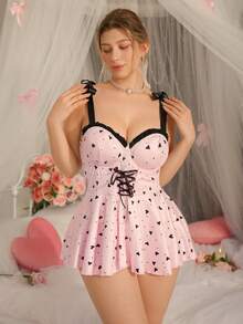 DelicateAllure Pink & Black Heart Print, Bow Strap, Tie Waist, Ruffle Hollow Back Sexy Romper Dress