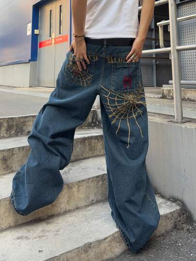 Jeans larghi da uomo con motivo ricamato a ragnatela