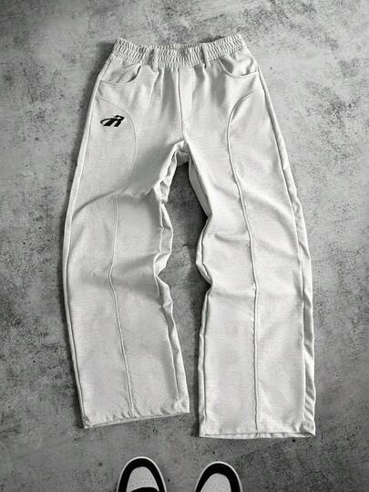 Pantaloni della tuta larghi con patchwork, stile di strada retrò per uomo