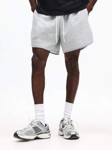 SUMWON Quần short jogger vải thun Pháp, gấu quần cong, eo có dây rút và túi bên hông, thích hợp mặc hàng ngày trong mùa hè. - Màu Xám nhạt - Xem 5