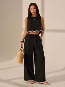 SHEIN PETITE Bộ đồ nữ thời trang nghỉ dưỡng thường ngày phối màu tương phản gồm áo hai dây và quần dài, màu đen, thích hợp cho mọi mùa, áo không tay và quần dài, trang phục mùa thu, trang phục công sở thường ngày, quần ống rộng, áo ren viền sóng mùa hè. - màu đen - Xem 7