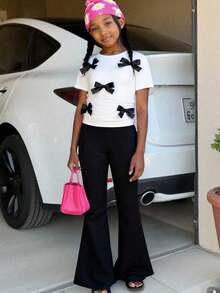 SHEIN Sparklyn 女童优雅百搭3D蝴蝶结褶皱短袖圆领露脐针织T恤+修身喇叭裤针织两件套 - 黑色 - 查看 1