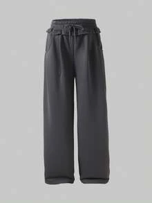 Sparklyn 一套女士及少女时尚宽松舒适灰色卫衣裤套装，采用毛边下摆设计，喇叭裤型，适合休闲、旅行、聚会、运动、上学、通勤等多种场合，春、秋、冬三季皆宜。 - 深灰色 - 查看 3