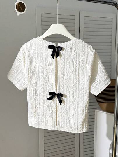 Camiseta de cuello redondo casual y minimalista cómoda para adolescentes con decoración de lazo de color contrastante