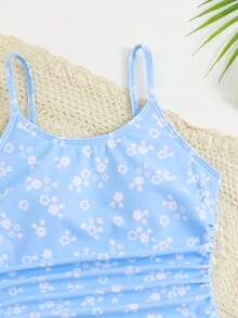 SHEIN Bộ áo tắm liền thân xếp nếp in hoa cho bé gái tuổi teen, kèm chân váy xoắn màu trơn. - Xanh và trắng - Xem 4