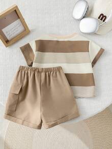 SHEIN Bộ 2 món cho bé trai mùa hè, gồm áo thun ngắn tay và quần short kaki cạp chun in hình gấu hoạt hình dễ thương. - Nhiều màu - Xem 2