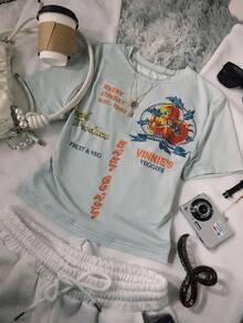 Glimmora Áo thun nữ in hình trái cây màu xanh bụi, áo crop top tay ngắn cổ tròn in họa tiết ôm vừa vặn, phong cách mùa hè, thích hợp cho kỳ nghỉ và trang phục thường ngày, món quà tuyệt vời cho bạn bè và thời trang. - Nhiều màu - Xem 4