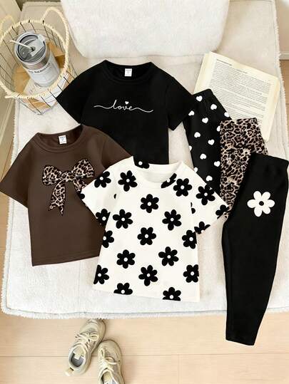 SHEIN Playful Pals Conjunto de 6 piezas de camiseta corta y leggings casuales y elegantes para niñas con estampados personalizados de leopardo, lazo, corazón, flor negra y eslogan, cómodo para uso diario, adecuado para primavera, verano y otoño