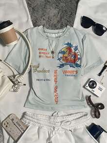 Glimmora Áo thun nữ in hình trái cây màu xanh bụi, áo crop top tay ngắn cổ tròn in họa tiết ôm vừa vặn, phong cách mùa hè, thích hợp cho kỳ nghỉ và trang phục thường ngày, món quà tuyệt vời cho bạn bè và thời trang. - Nhiều màu - Xem 3