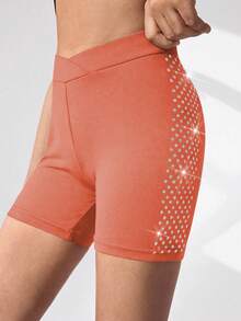 女童运动短裤，橙色修身款，侧边饰有激光亮片图案，休闲日常穿着，适合海滩、度假、体操等场合。 - 橘色 - 查看 4