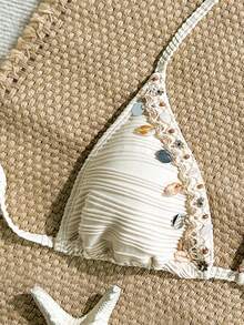 SHEIN Swim Vcay 2026新款女士泳装上市，适合上学、度假、约会、下午茶、西式、邮轮、海滩、海岛、公路旅行、四季皆宜、音乐节、波西米亚风度假、秋日休闲、西部波西米亚风等场合。优雅的女士上衣采用纹理面料，饰以亮片贝壳，可爱性感，适合海滩/度假穿着。贝壳比基尼、海星比基尼、可爱比基尼上衣、两件套沙滩套装、串珠比基尼、水钻比基尼、亮片比基尼等款式，应有尽有。 - 彩色 - 查看 4