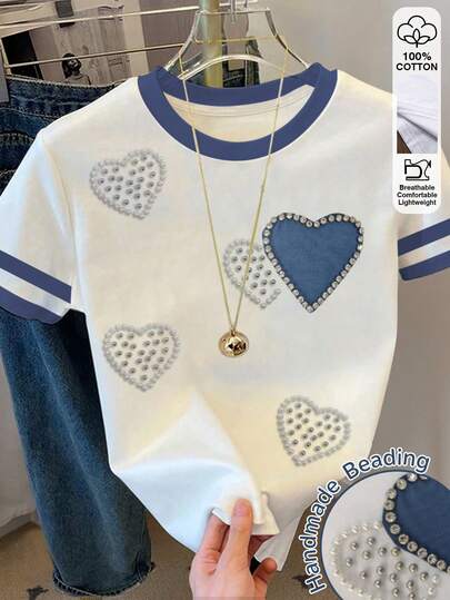 Resyla Camiseta casual de mujer con cuello redondo, bloque de color y estampado de corazón de manga corta