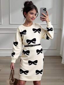 SHEIN 女童毛衣连衣裙，可爱款式，黑色蝴蝶结提花图案，圆领，常规袖，袖口和下摆收紧，厚度适中，象牙色优雅针织连衣裙，知性时尚修身版型，适合春、秋、冬季穿着。 - 杏色 - 查看 9