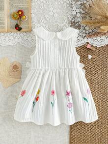 SHEIN Đầm không tay dễ thương cho bé gái với họa tiết hoa 3D và nơ, thích hợp mặc ở nhà, chơi ngoài trời và đi nghỉ mát. - trắng - Xem 2