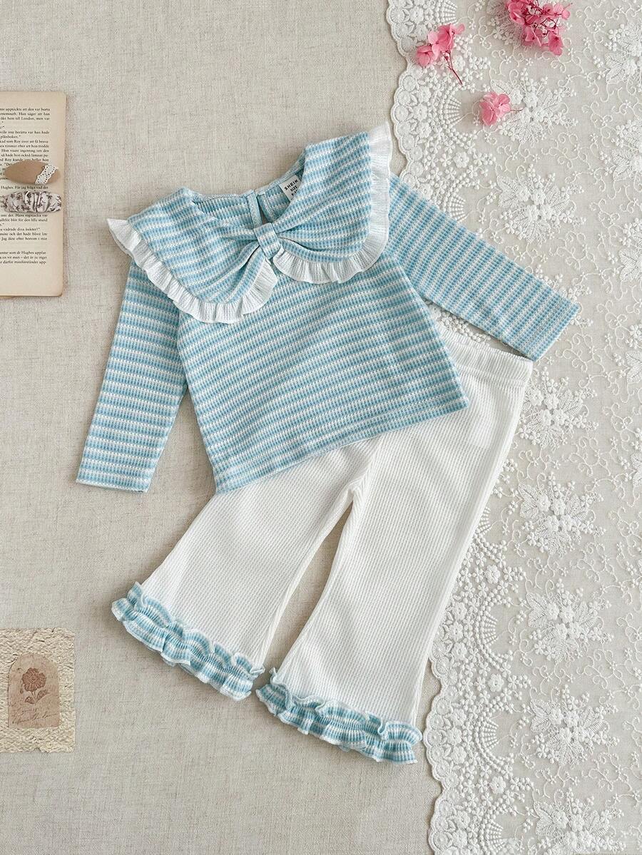 SHEIN 2pcs Baby Girls' Sweet Princess Style Pink & White Striped Outfit, Essential For Everyday Outings & Family Gatherings, Autumn/Winter 2025. Featuring: Waffle Knit Fabric, Collared Top With Ruffle Trim & 3D Bow Accent, Cute Striped Pattern, Flared Pants With Ruffle Hem. - Blue - View 1