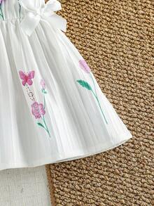 SHEIN Đầm không tay dễ thương cho bé gái với họa tiết hoa 3D và nơ, thích hợp mặc ở nhà, chơi ngoài trời và đi nghỉ mát. - trắng - Xem 6