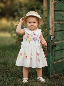 SHEIN Đầm không tay dễ thương cho bé gái với họa tiết hoa 3D và nơ, thích hợp mặc ở nhà, chơi ngoài trời và đi nghỉ mát. - trắng - Xem 5