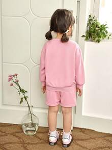 SHEIN Genkimix Kids Bộ 2 áo nỉ cổ tròn tay dài trang trí nơ màu mơ và quần ống loe kaki cho bé gái, trang phục thường ngày thời trang cho mùa xuân/thu - Hồng - Xem 2
