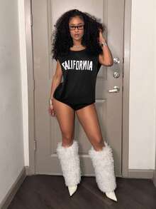 Slaydiva جمبسوت قصيرة نسائية بأكمام بلا أكمام وياقة دائرية فضفاضة باللون الأسود، بطبعة حرفية، مناسبة للأسلوب الكاجوال اليومي. مناسبة لعيد الحب، المواعيد، الحفلات، التجمعات، العطلات، الحفلات الموسيقية، النوادي الليلية، الخروجات اليومية، رأس السنة، الاحتفالات، وجبة الغداء، فتاة ساخنة، العطلات، ملابس المطار، ملابس ضيوف الزفاف، موسم الزفاف - ب - الأسود - مشاهدة 4