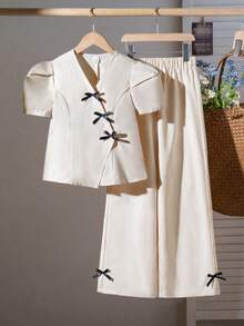 SHEIN Elladie kids 2件套女童泡泡袖上衣，斜扣设计，褶裥下摆，搭配直筒阔腿裤套装 - 杏色 - 查看 5