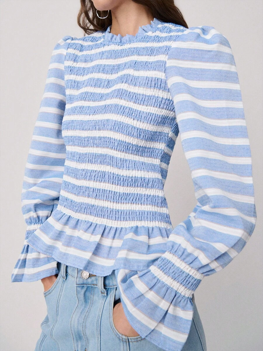 Nöista Striped Blouse Features Puffed Long Sleeves With Ruffled Cuffs And A Delicate Peplum Hem. Fitted Silhouette. Spring, Summer. - Blue - View 1