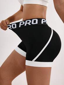 Dewbera Shorts esportivos femininos com elástico e cores contrastantes - Preto e Branco - Ver 1