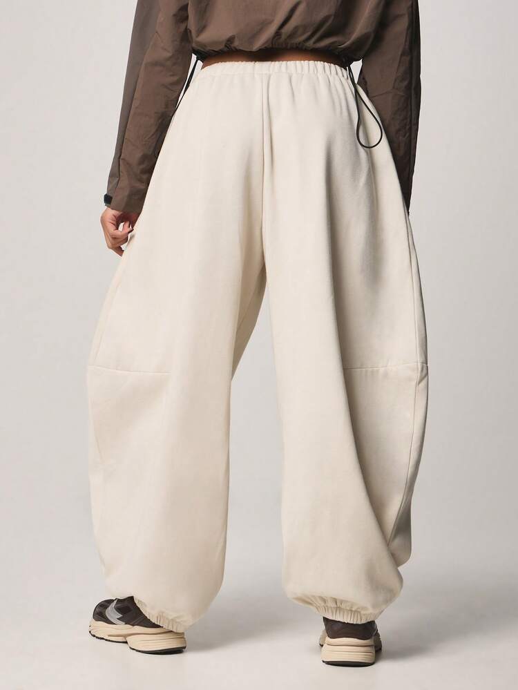 MISSGUIDED Pantalon de jogging à taille haute, forme ballon, jambes larges, décontracté. Taille élastique avec cordon de serrage, poignets aux chevilles. Coupe ample et ample, vêtement d'intérieur