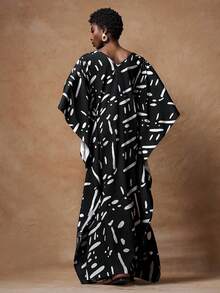 Zivah 2025春夏新品，适合生日派对、宴会、返校、学院风、学生装、日常休闲、百搭基础款、邮轮旅行、潮流、街头风、优雅、通勤、商务休闲等场合，V领七分袖开衩设计，略微宽松版型，蝙蝠袖，黑米色斑马纹印花长款连衣裙，女士连衣裙 - 黑與白 - 查看 2